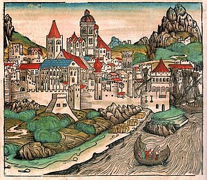 Holzschnittdruck, die befestigte Stadt Mainz im Hintergrund, der Rhein im Vordergrund, darauf ein Schiff, am Ufer liegen Holzfässer